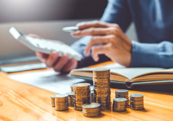 Saving money concept Man hand putting Row and coin Write Finance Saving money concept Man hand putting Row and coin Write Finance